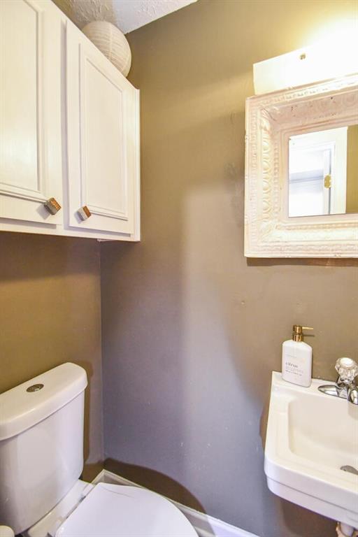 1235 Riverside Dr Unit H3, Gainesville, GA 30501 - bathroom with toilet and a sink