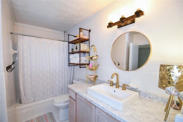 1235 Riverside Dr Unit H3, Gainesville, GA 30501 - bathroom featuring toilet, ornamental molding, shower / bath combo, vanity, and a textured ceiling