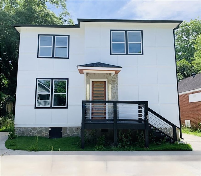 view of front of property with a deck