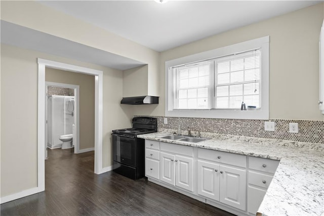 kitchen featuring sink, white cabinetry, dark hardwood / wood-style floors, electric range, and range hood