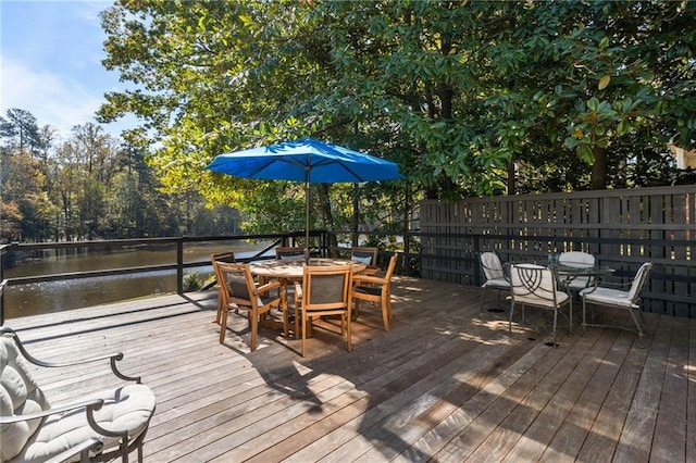 deck featuring a water view