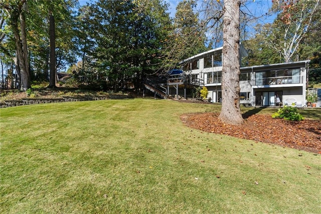 view of yard featuring a sunroom