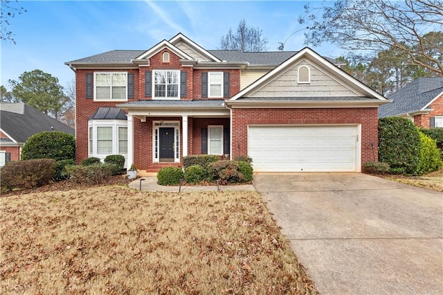 view of front of property with a garage