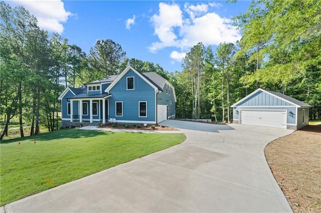 view of front of home with board and batten siding, a garage, and a front lawn