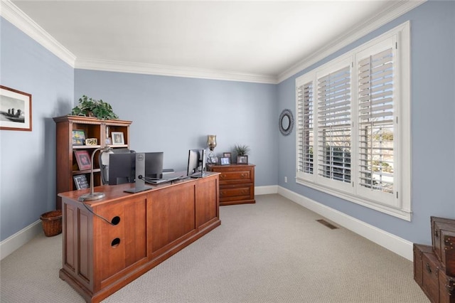 home office with light carpet, baseboards, and crown molding