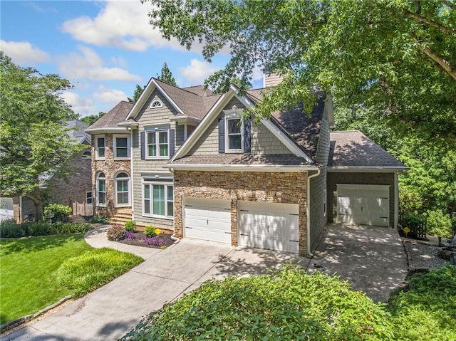 craftsman-style house with a front yard