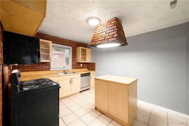 kitchen featuring electric range, dishwasher, sink, brick wall, and a kitchen island