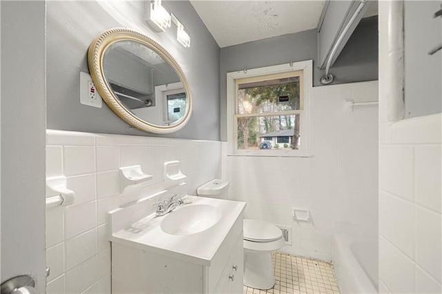 bathroom featuring toilet and tile walls