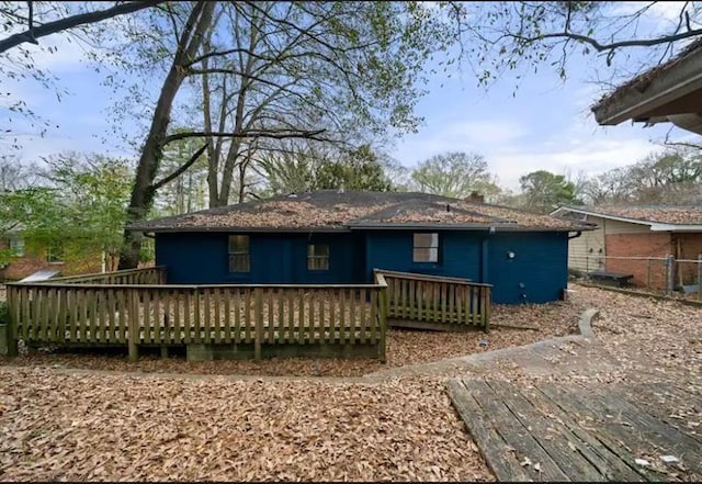 rear view of house with a deck