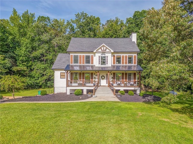 323 Schoolhouse Rd, Rockmart, GA 30153 - view of front of property with covered porch, a chimney, and a front yard