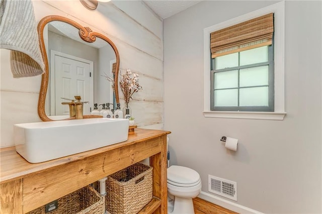 323 Schoolhouse Rd, Rockmart, GA 30153 - bathroom with toilet and vanity