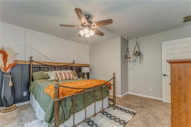323 Schoolhouse Rd, Rockmart, GA 30153 - bedroom with carpet floors, a ceiling fan, and a textured ceiling