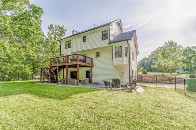 323 Schoolhouse Rd, Rockmart, GA 30153 - back of property with stairway, a wooden deck, a patio, and view of wooded area
