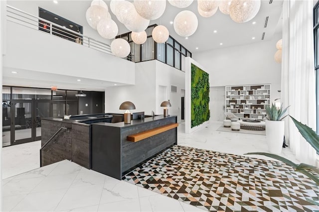775 Juniper St NE Unit 334, Atlanta, GA 30308 - welcome area with a high ceiling, recessed lighting, and french doors