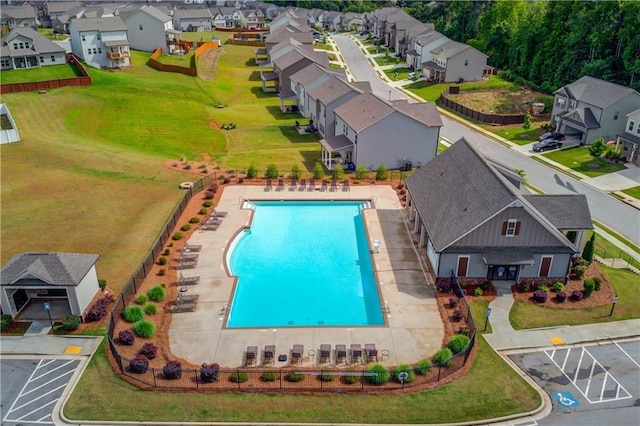 aerial perspective of suburban area with a pool area