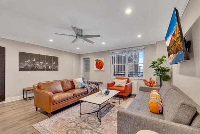 living room with baseboards, ceiling fan, wood finished floors, and recessed lighting