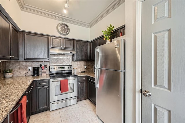 kitchen with appliances with stainless steel finishes, light stone countertops, light tile patterned floors, and backsplash