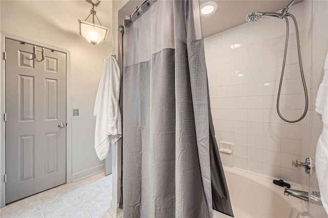 bathroom featuring tile patterned flooring and shower / bath combination with curtain