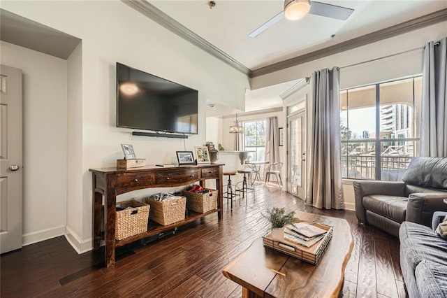 living room featuring crown molding, hardwood / wood-style flooring, and ceiling fan