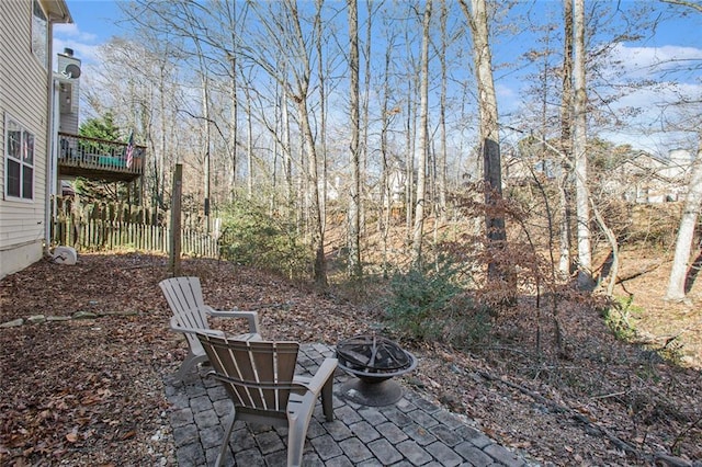 view of patio / terrace with an outdoor fire pit