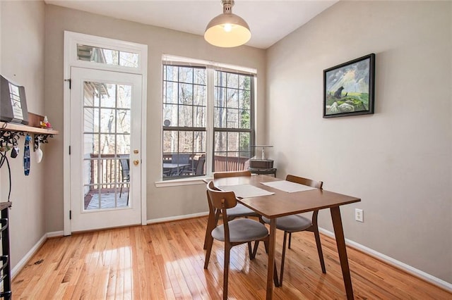 dining room featuring light wood-type flooring