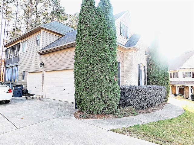 view of home's exterior featuring a garage