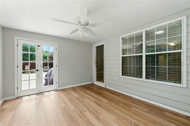 314 Spring Falls Dr, Lawrenceville, GA 30045 - unfurnished room with wood finished floors, french doors, and ceiling fan