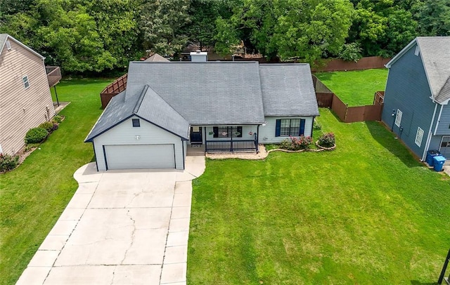 314 Spring Falls Dr, Lawrenceville, GA 30045 - view of front facade with a porch, driveway, and roof with shingles