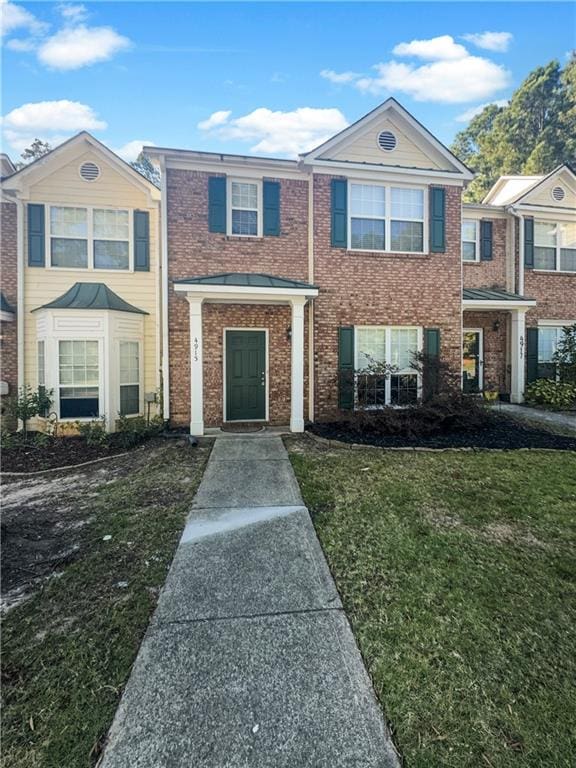 view of front of home with a front yard