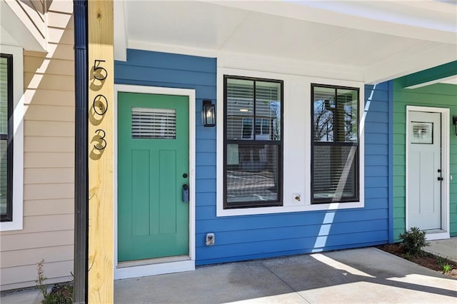 entrance to property with covered porch