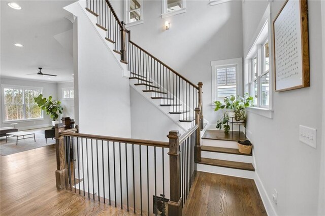 2304 Isla Run, Woodstock, GA 30188 - stairs with wood finished floors, baseboards, recessed lighting, and a ceiling fan