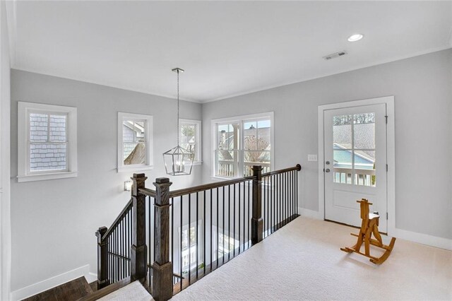 2304 Isla Run, Woodstock, GA 30188 - hallway with an upstairs landing and baseboards