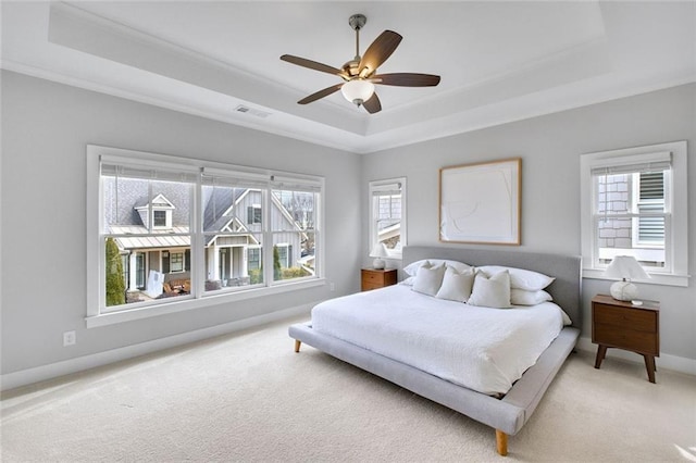 2304 Isla Run, Woodstock, GA 30188 - bedroom featuring a tray ceiling, light colored carpet, baseboards, ornamental molding, and ceiling fan