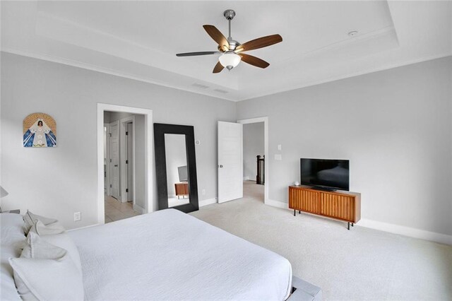 2304 Isla Run, Woodstock, GA 30188 - bedroom with crown molding, light carpet, a raised ceiling, baseboards, and ceiling fan
