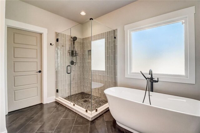 569 White Oak Way, Monroe, GA 30655 - bathroom featuring independent shower and bath