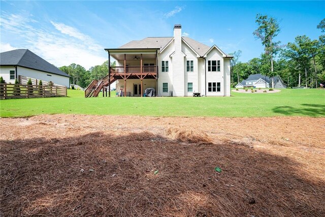 569 White Oak Way, Monroe, GA 30655 - back of property with a lawn, ceiling fan, and a deck
