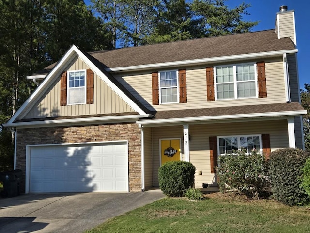 view of front of property with a garage