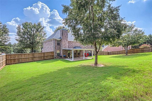 view of yard with a gazebo and a patio area