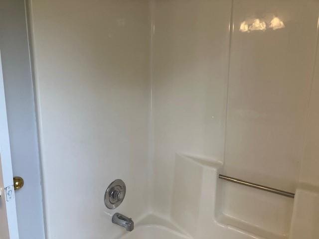 details with shower / bath combination