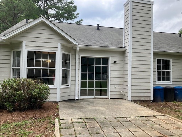 rear view of house with a patio