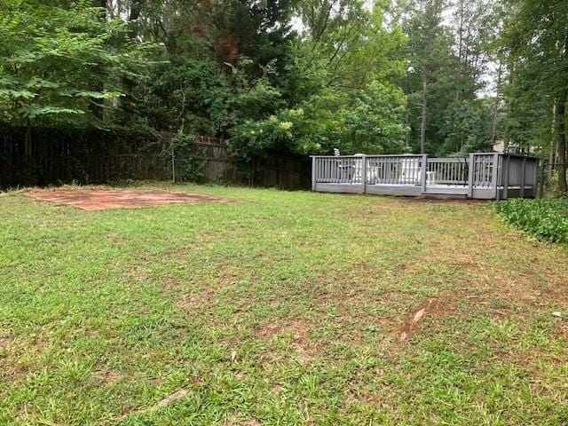 view of yard featuring a deck