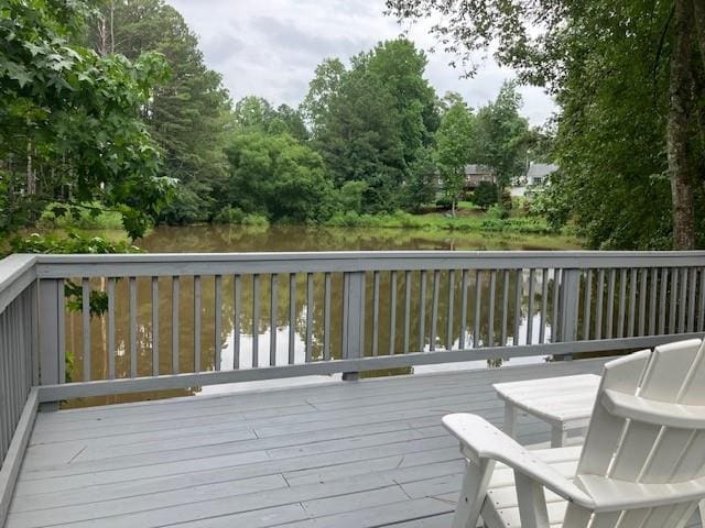 deck featuring a water view