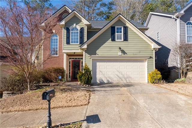 front of property with a garage