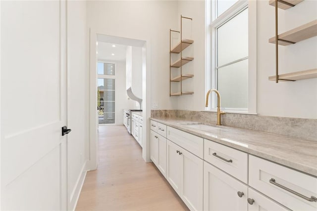 260 Guild Ln, Fayetteville, GA 30214 - interior space featuring a sink, recessed lighting, and light wood-style flooring