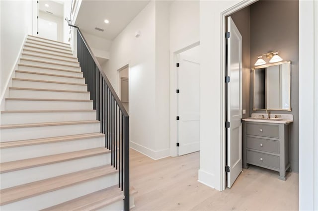 260 Guild Ln, Fayetteville, GA 30214 - staircase featuring baseboards, recessed lighting, wood finished floors, and visible vents