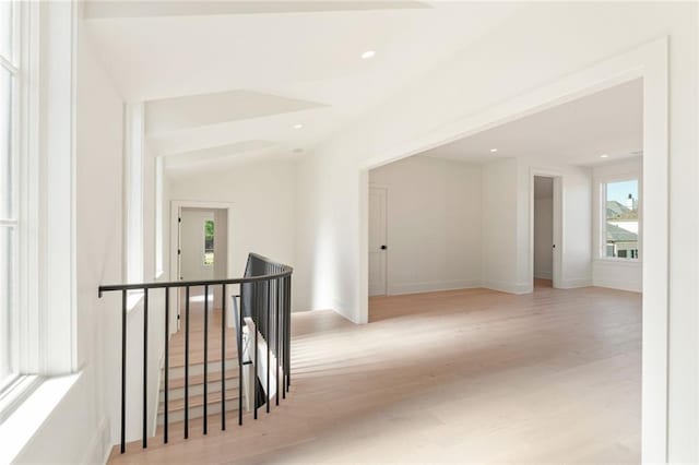 260 Guild Ln, Fayetteville, GA 30214 - hall featuring vaulted ceiling, light wood-type flooring, baseboards, an upstairs landing, and recessed lighting