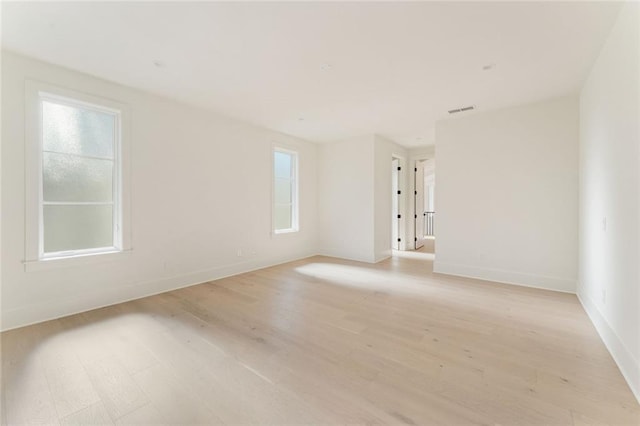 260 Guild Ln, Fayetteville, GA 30214 - empty room with visible vents, light wood-style flooring, and baseboards