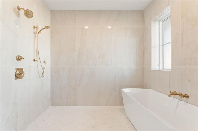 260 Guild Ln, Fayetteville, GA 30214 - bathroom featuring a freestanding bath and a tile shower