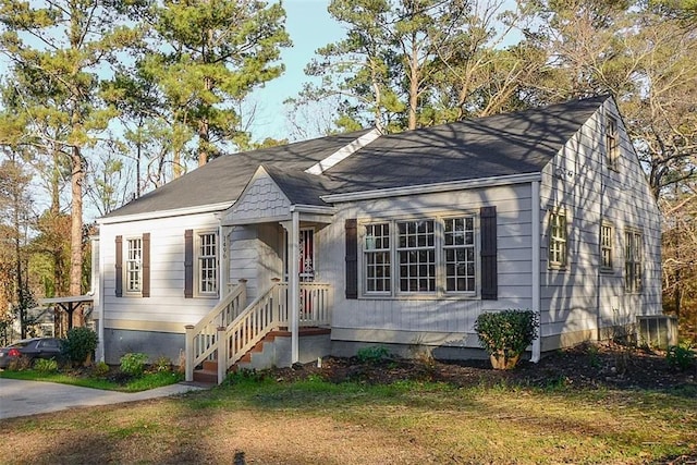 1496 S Hairston Rd, Stone Mountain, GA 30088 - view of front of home with a front yard and roof with shingles