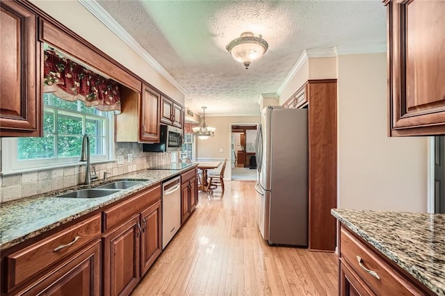3592 Midvale Cv, Tucker, GA 30084 - kitchen featuring stainless steel appliances, a sink, a textured ceiling, tasteful backsplash, and light stone countertops